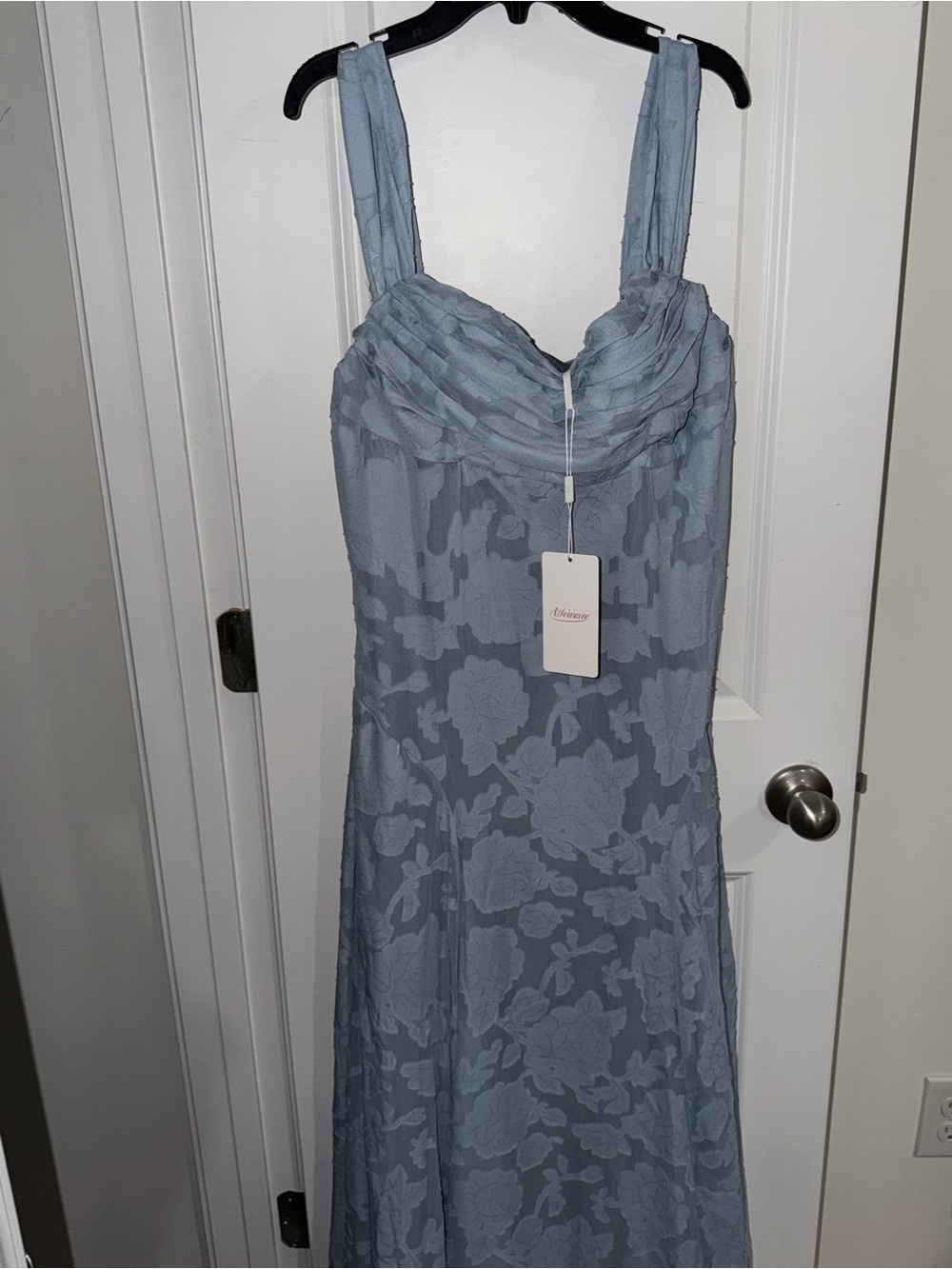 Elegant Light Blue Floral-Textured Sleeveless Dress